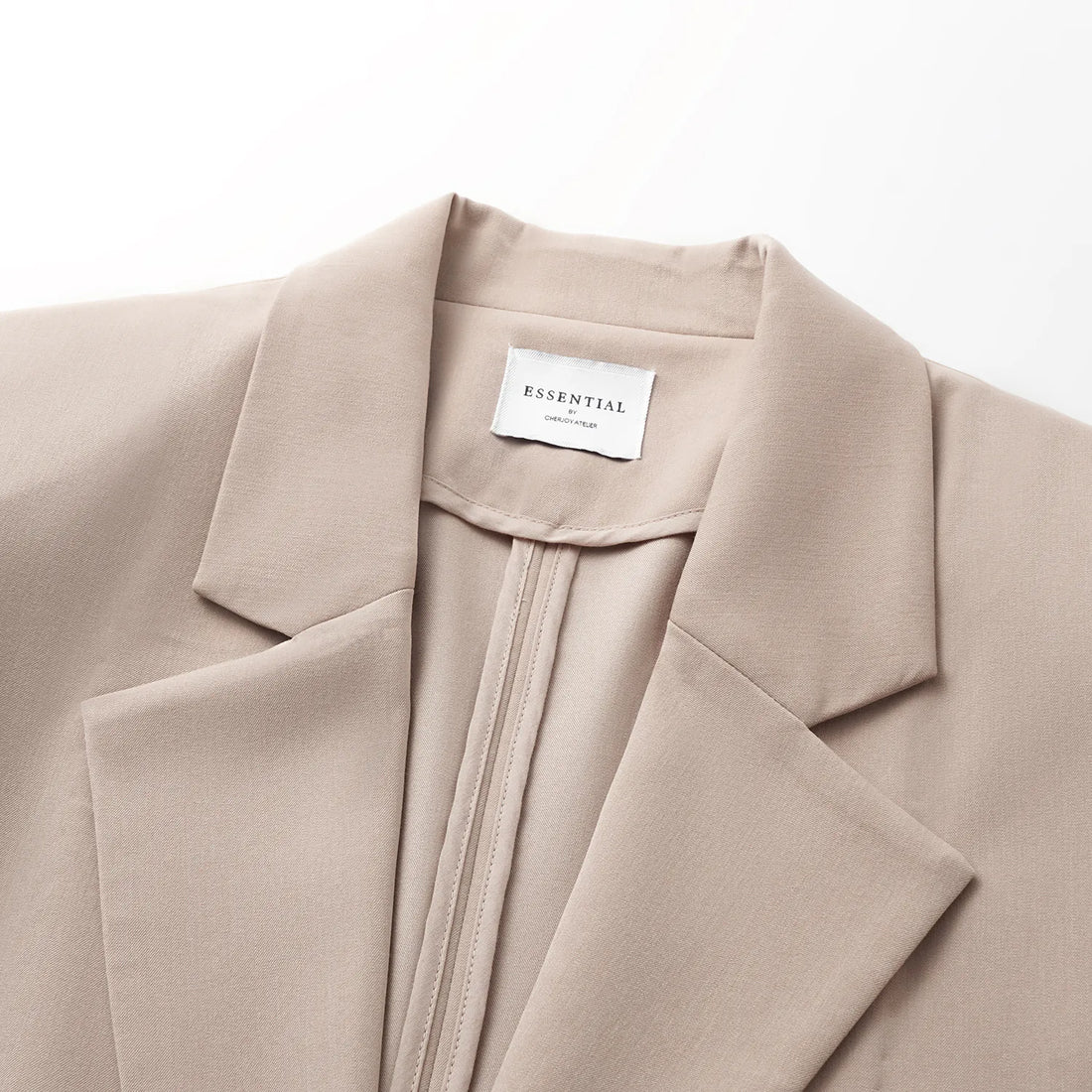 "Speak Sleek." Oversized suit jacket in Italian textured fabric—Taupe