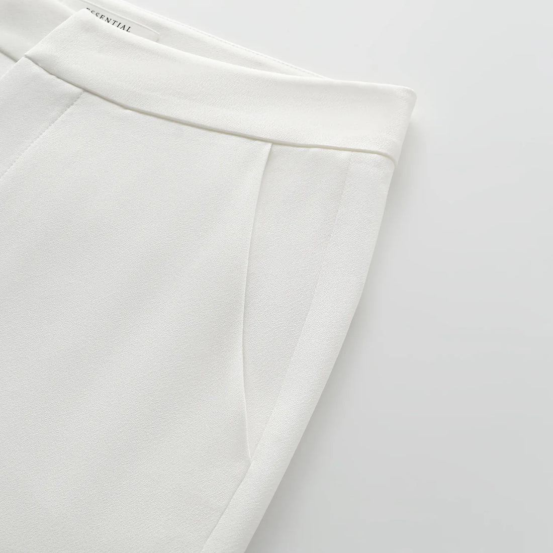 "Speak Sleek." Acetate flared pants—White