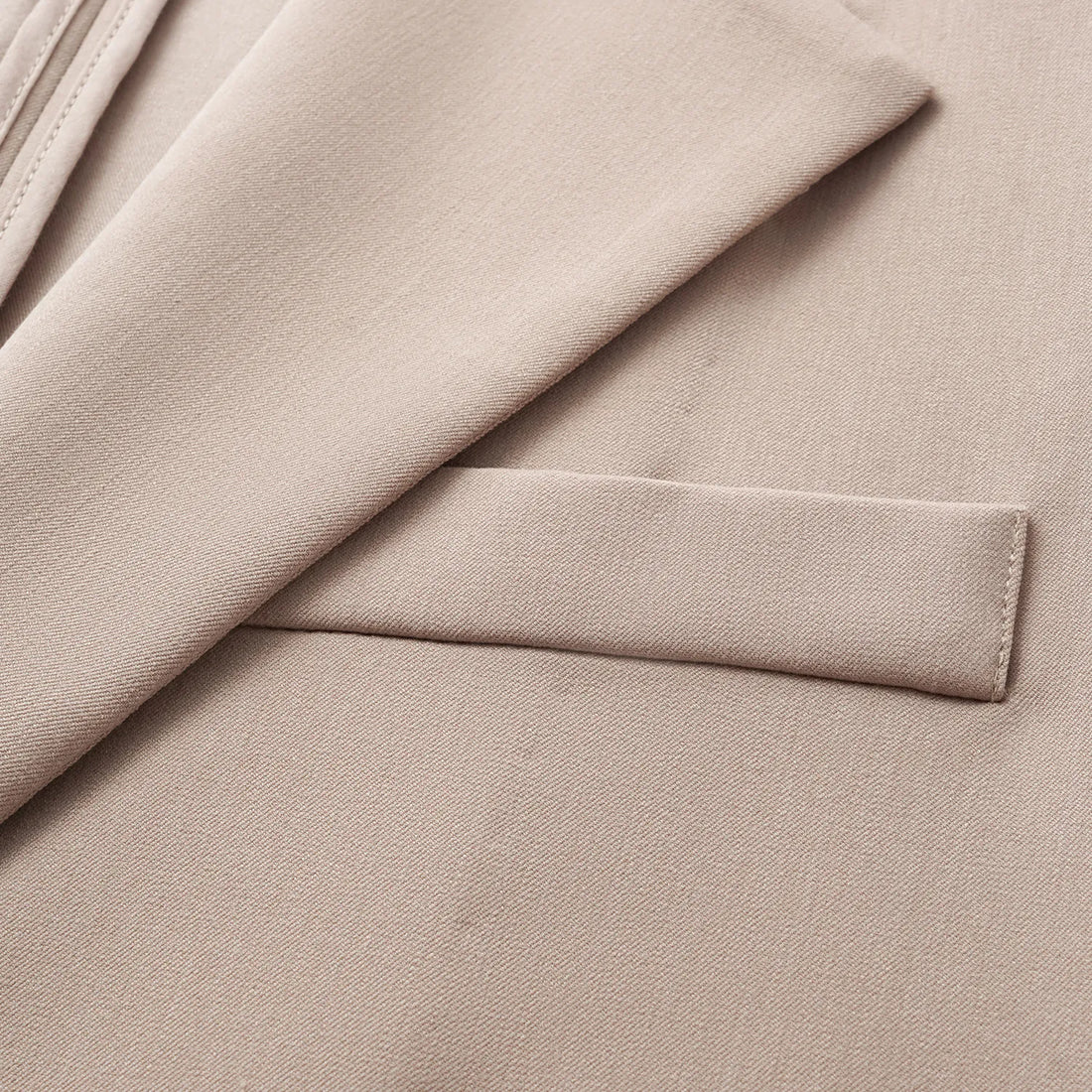 "Speak Sleek." Oversized suit jacket in Italian textured fabric—Taupe