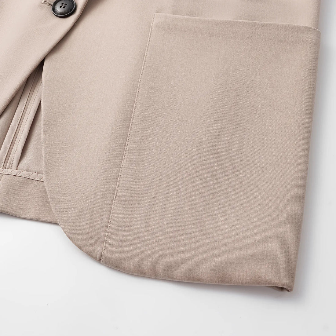 "Speak Sleek." Oversized suit jacket in Italian textured fabric—Taupe