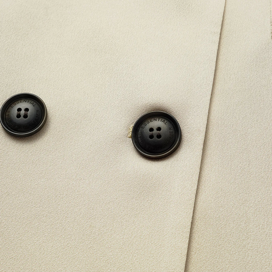 "Speak Sleek." Acetate double-breasted blazer—Champagne