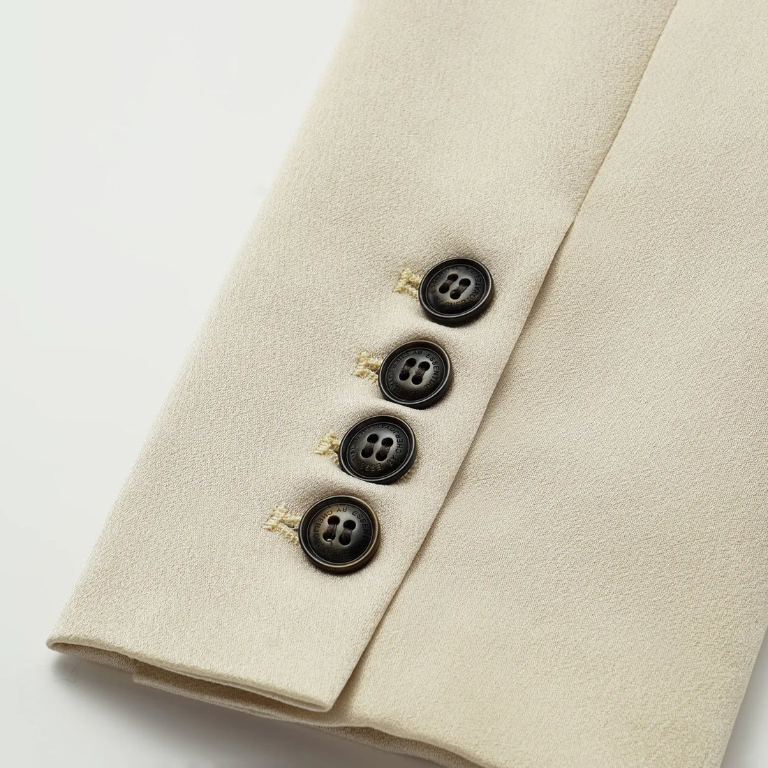 "Speak Sleek." Acetate double-breasted blazer—Champagne