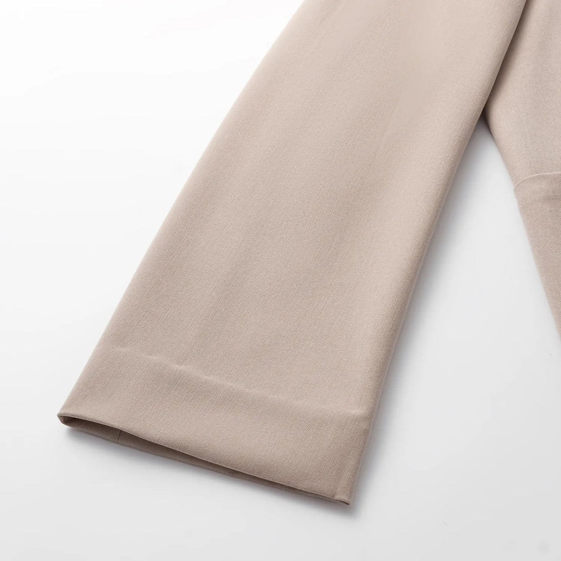 "Speak Sleek." Oversized suit jacket in Italian textured fabric—Taupe