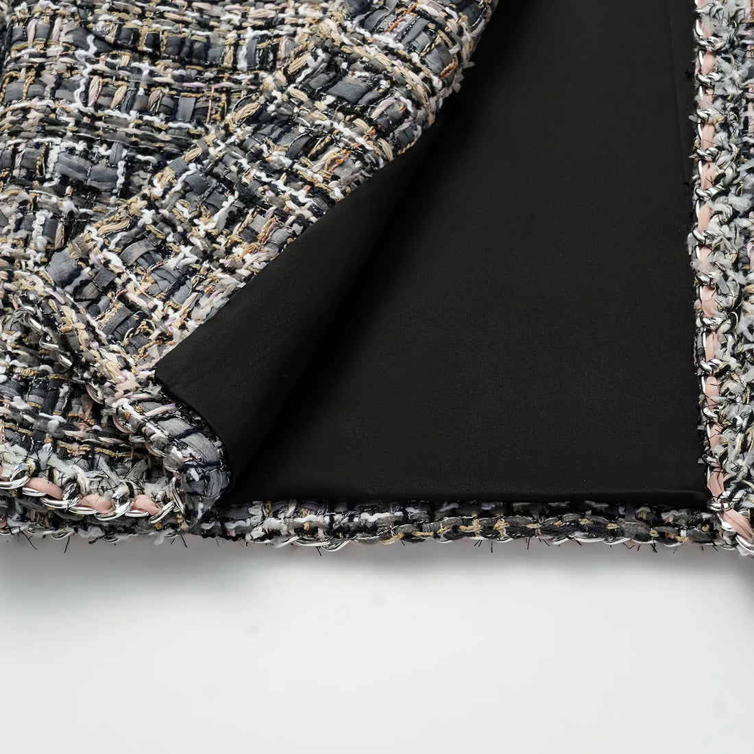 “Knightsbridge citywalk.” Tweed jacket—grey