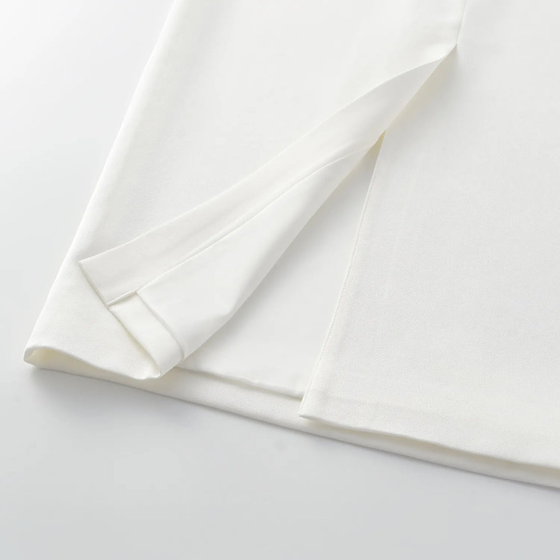 "Speak Sleek." Acetate pencil skirt—White