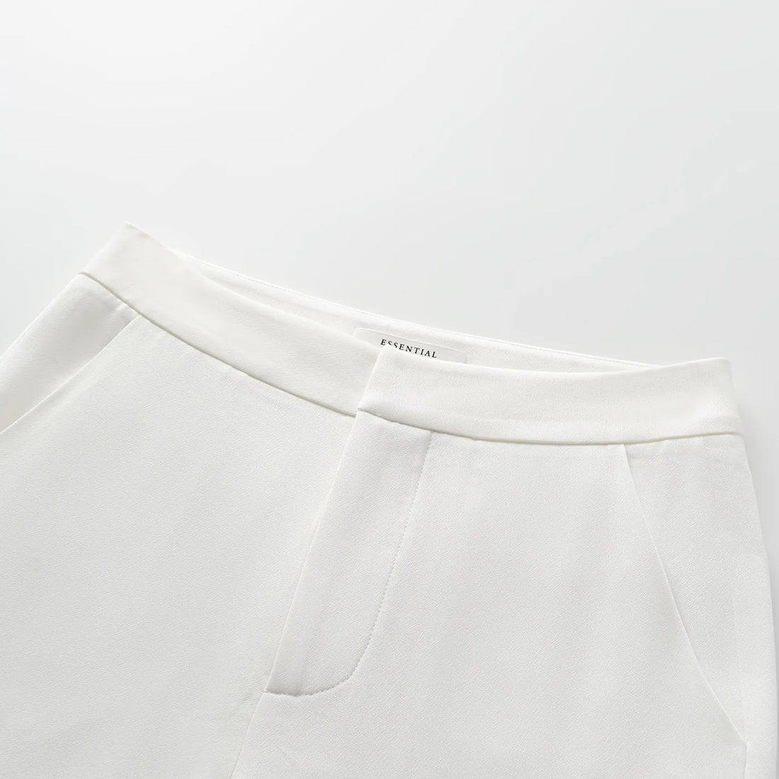 "Speak Sleek." Acetate flared pants—White