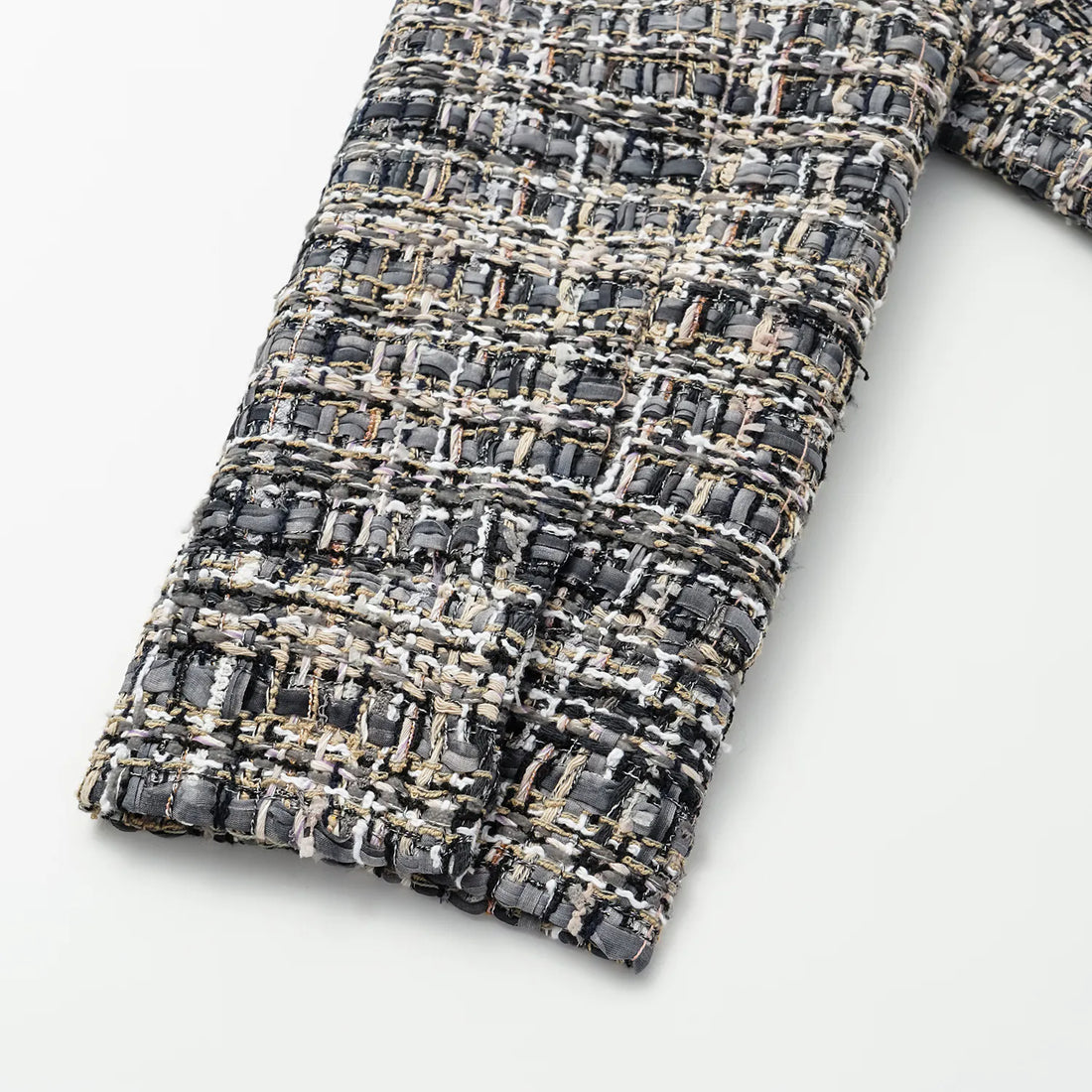 “Knightsbridge citywalk.” Tweed jacket—grey