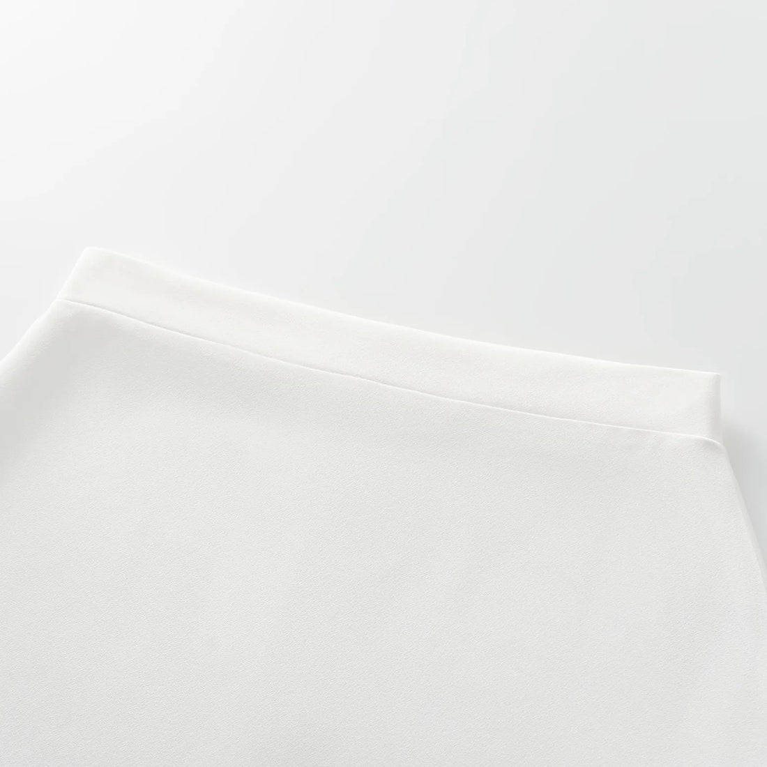 "Speak Sleek." Acetate pencil skirt—White