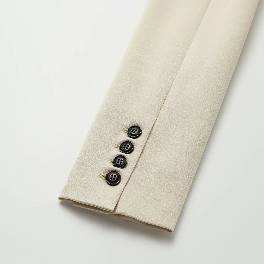 "Speak Sleek." Acetate double-breasted blazer—Champagne