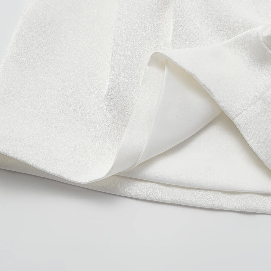 "Speak Sleek." Acetate Shorts—White