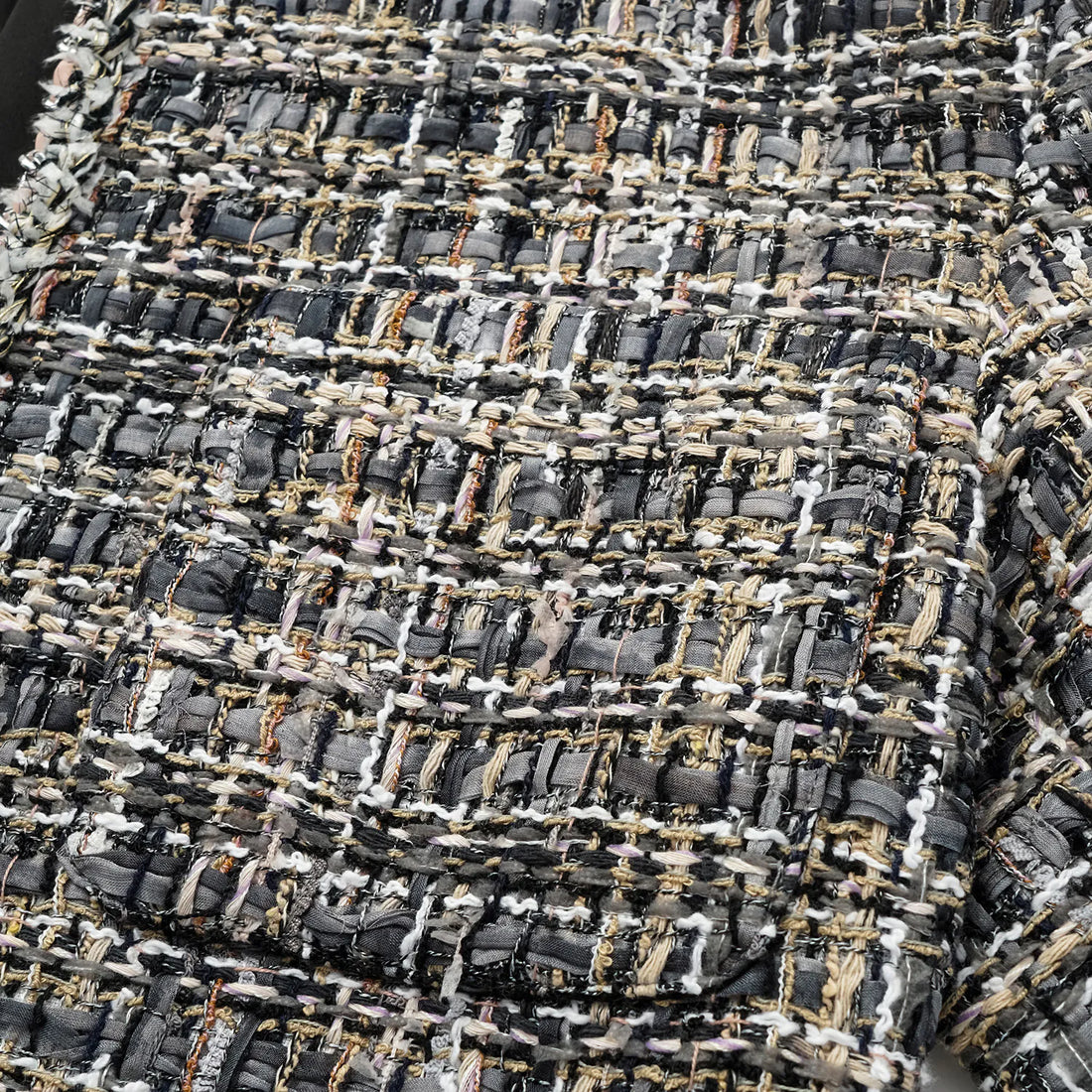 “Knightsbridge citywalk.” Tweed jacket—grey