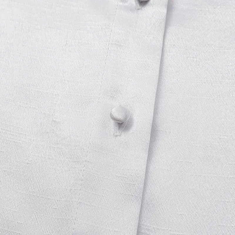 “Sloane Ave glam.” Cutout Shirt — White (matte/satin)