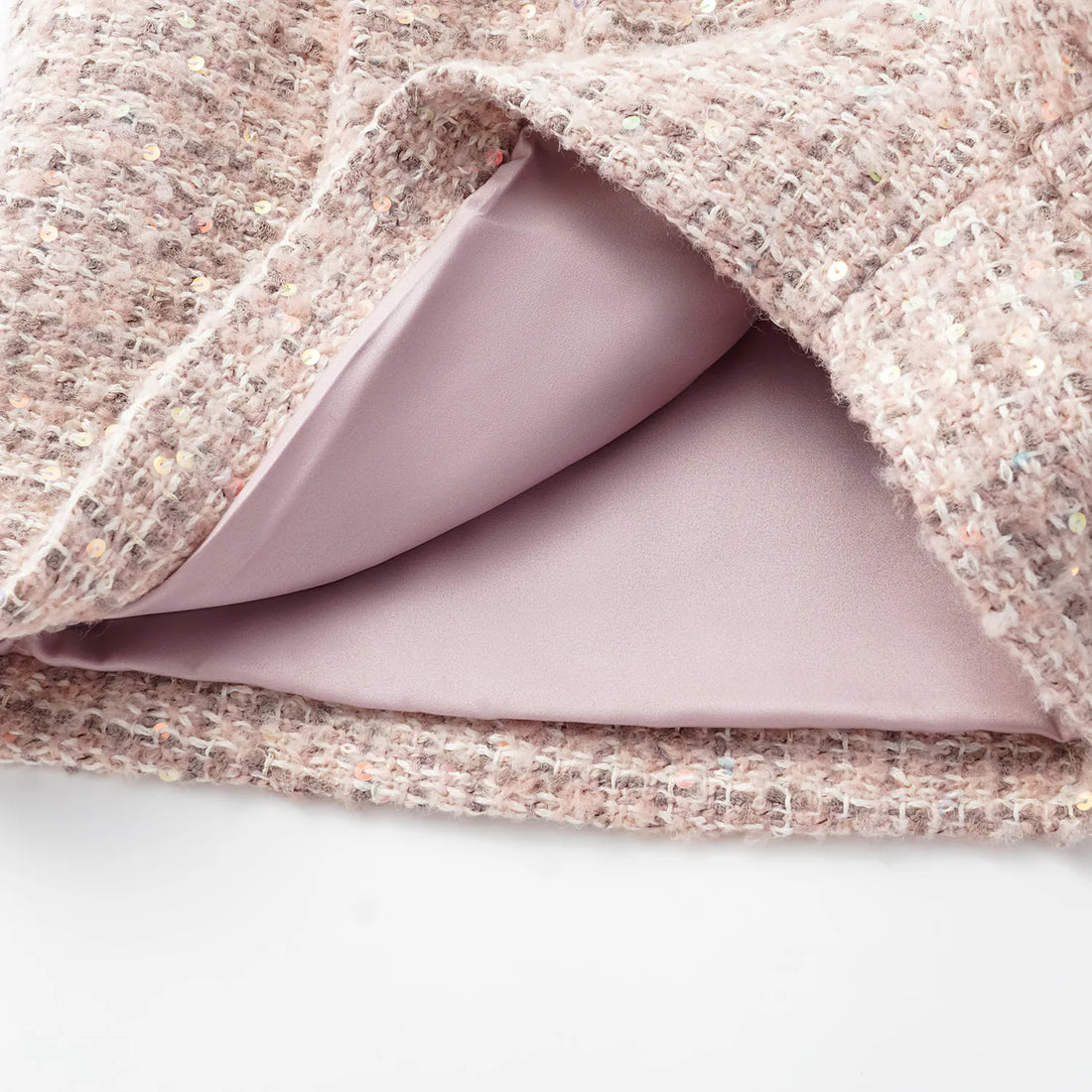 “Chelsea teatime.” Tweed shorts—Pink marshmallow