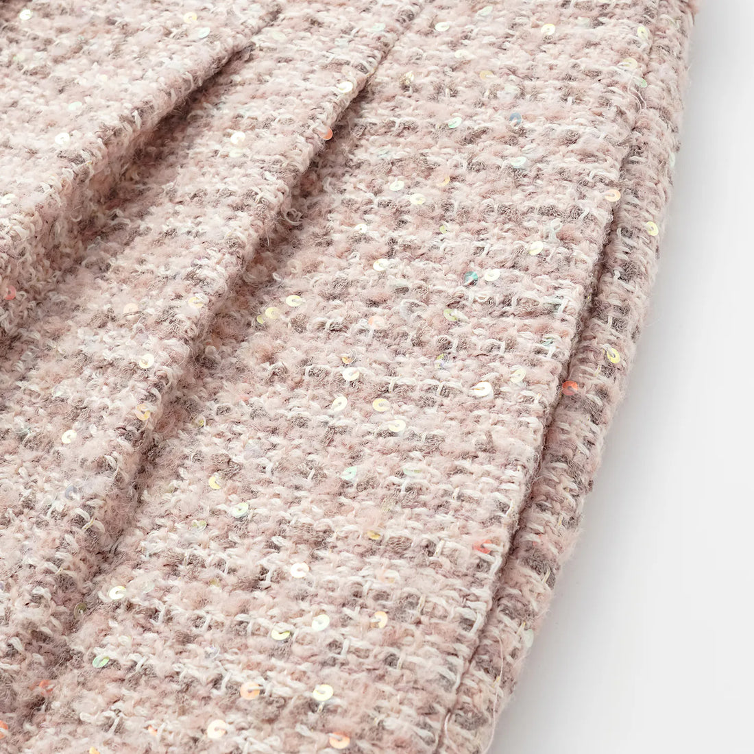“Chelsea teatime.” Tweed shorts—Pink marshmallow