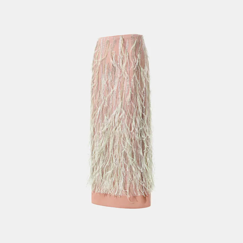 “Welcome to my party.” Beaded feather pencil skirt