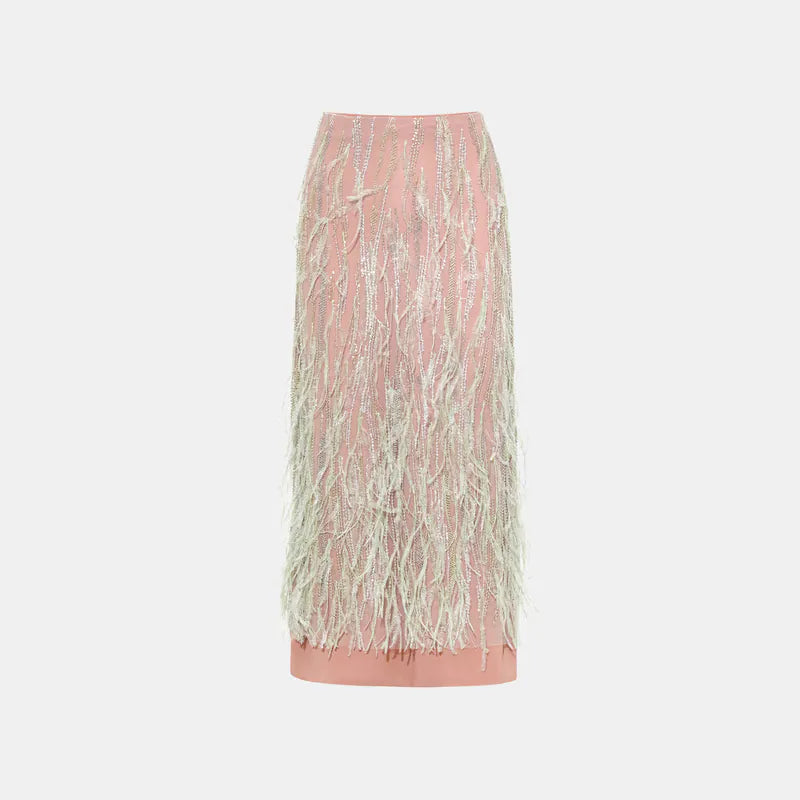“Welcome to my party.” Beaded feather pencil skirt
