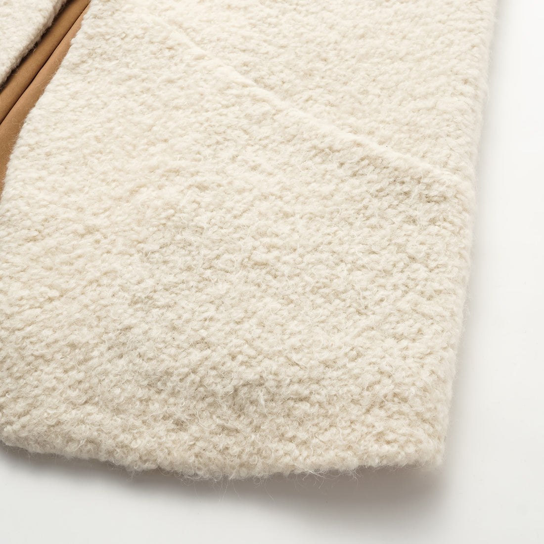 "Tops" alpaca vest
