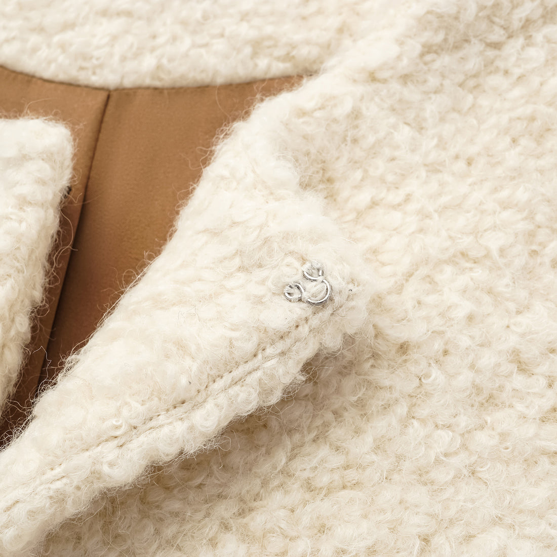 "Tops" alpaca vest