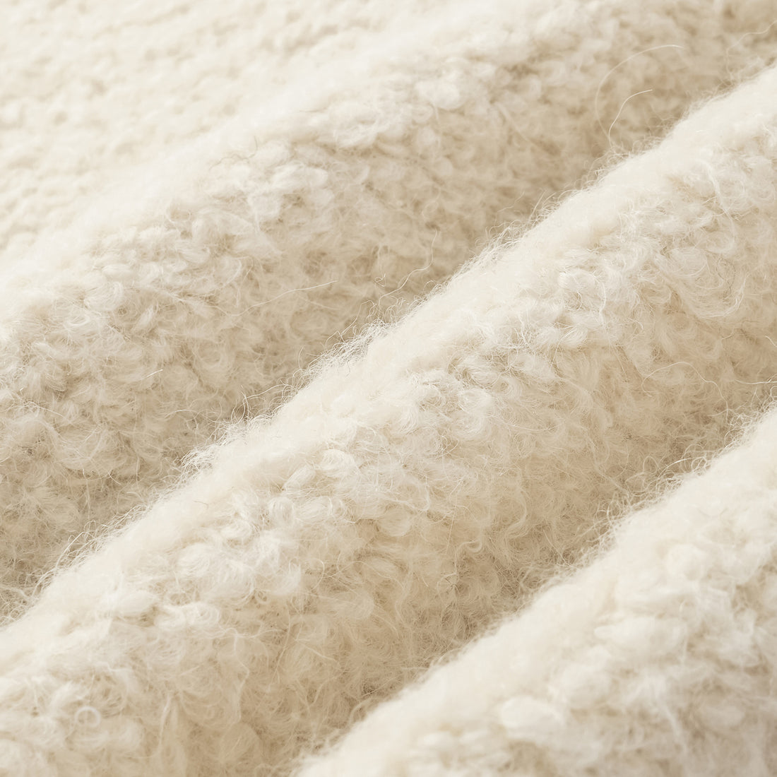 "Tops" alpaca vest