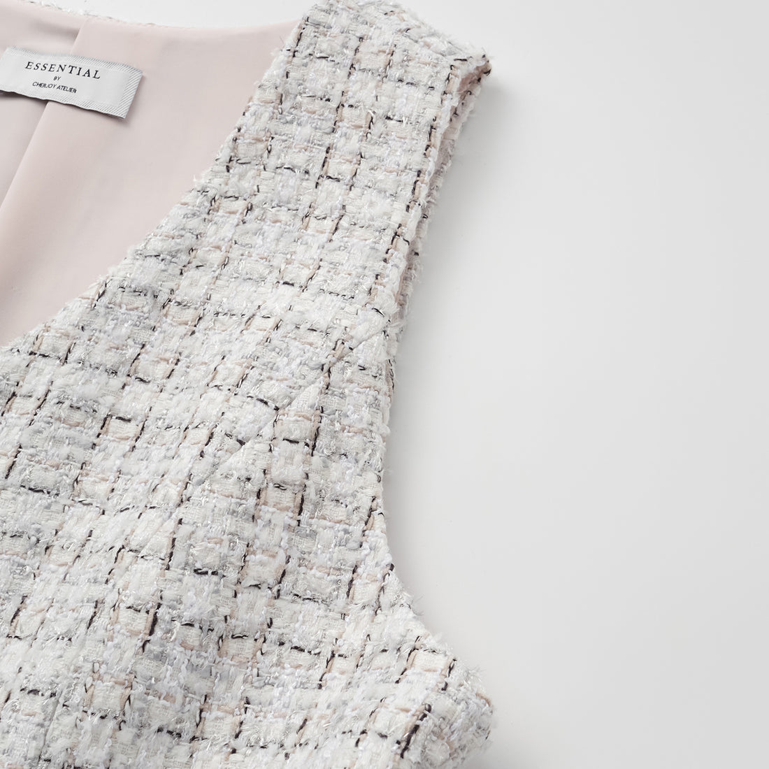 "Chelsea Citywalk." 3D-cut tweed vest - Blanc