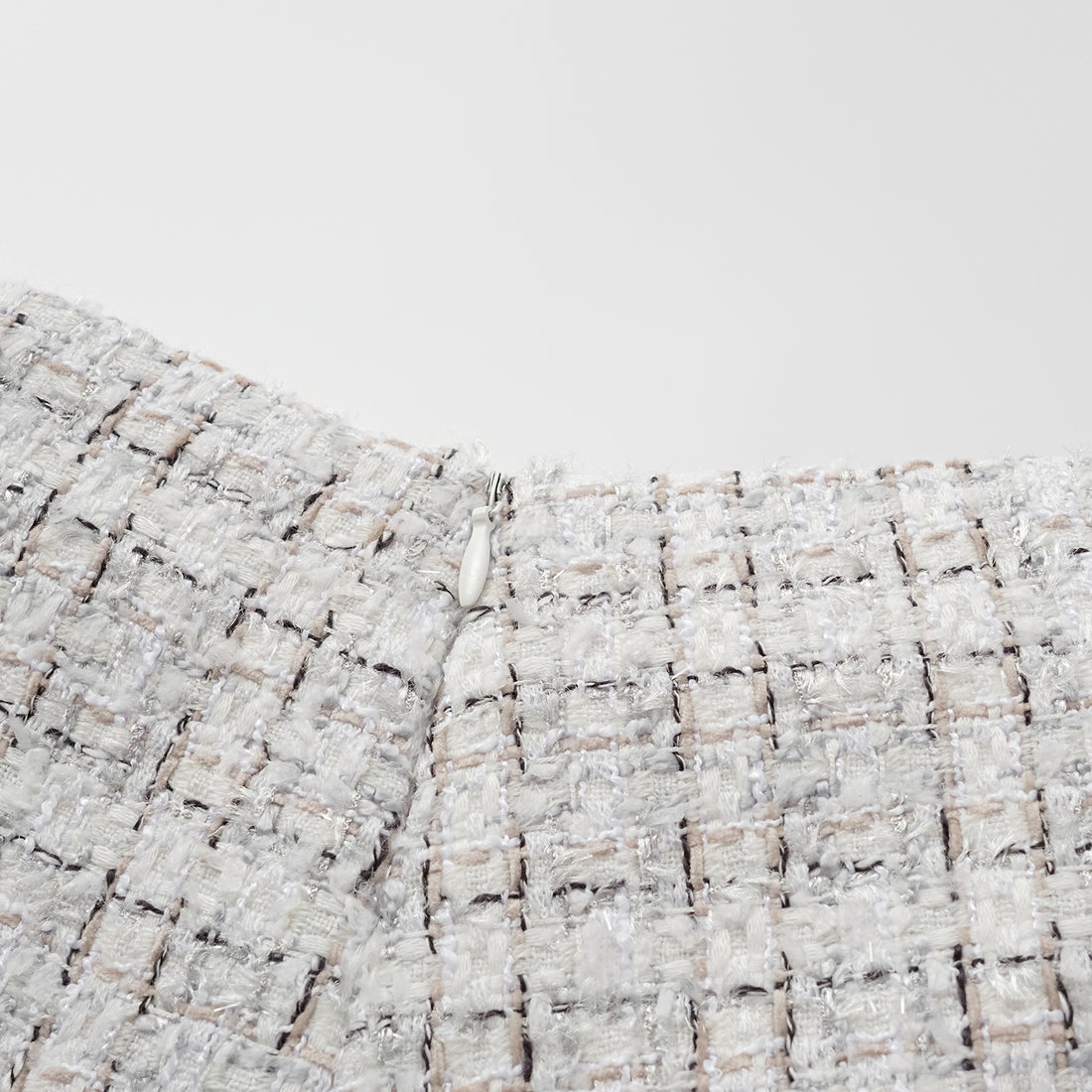 "Chelsea Citywalk." Tweed shorts—Blanc