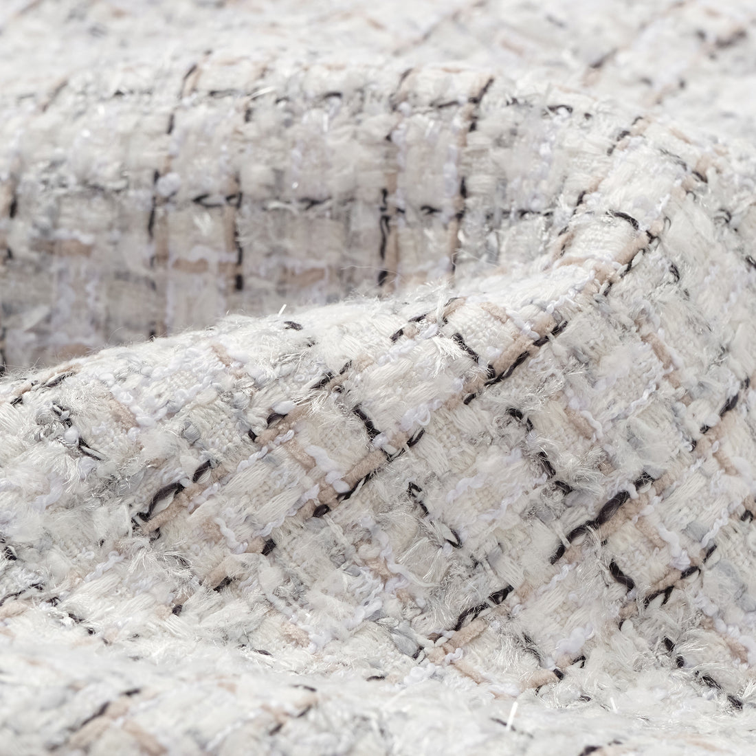 "Chelsea Citywalk." Tweed shorts—Blanc
