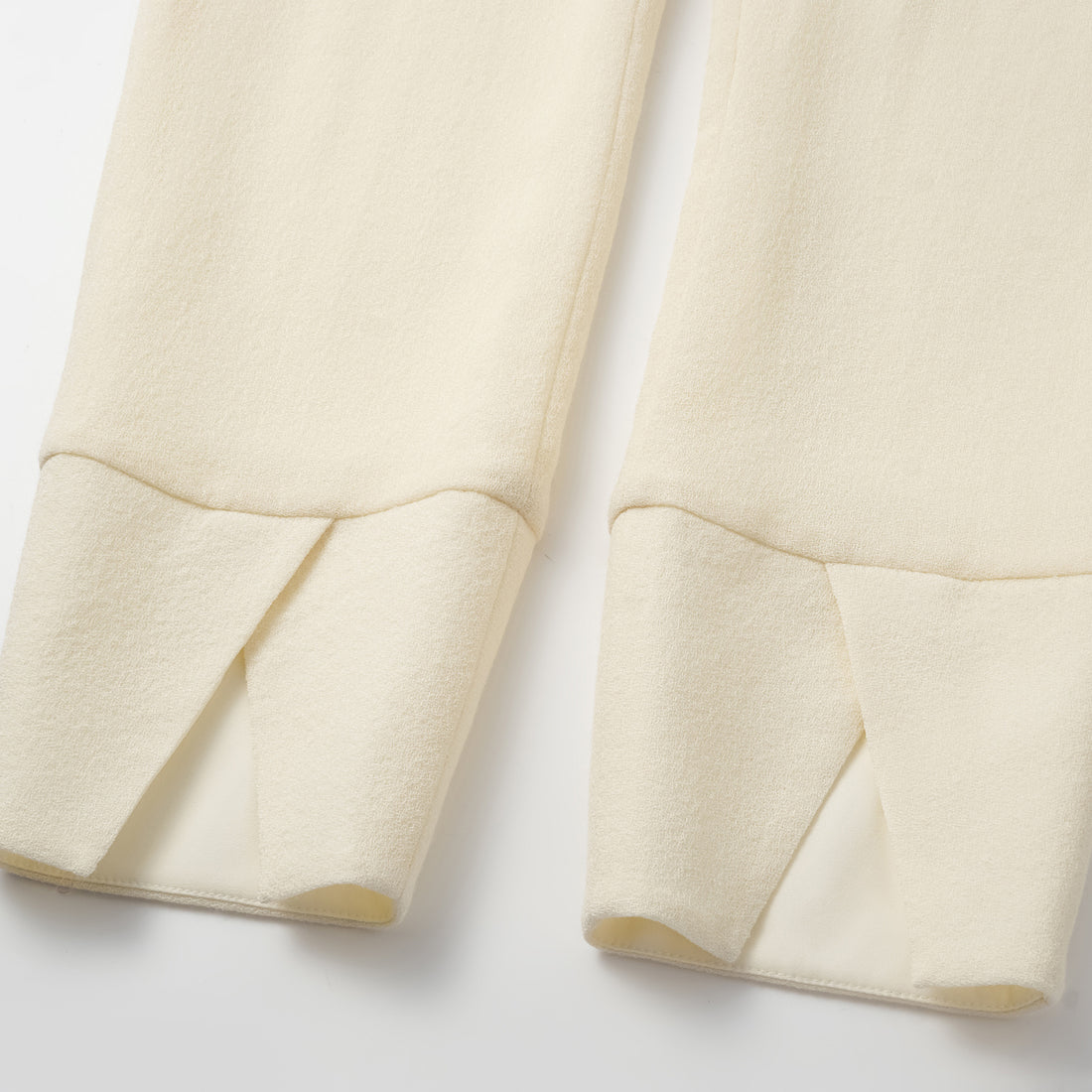 "The Top" British top crepe cropped trousers—Beige