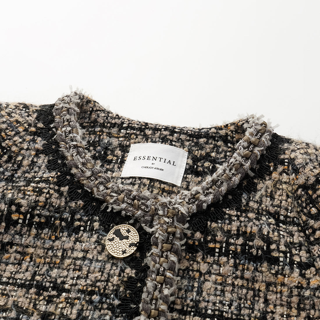 “Knightsbridge citywalk.” Tweed jacket – camel/black