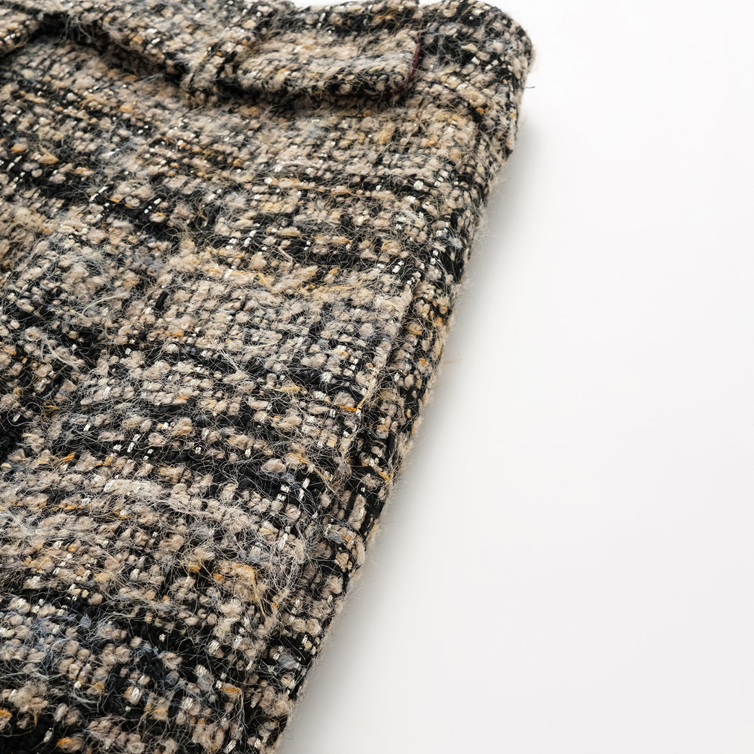 “Knightsbridge citywalk.” Tweed shorts – camel/black