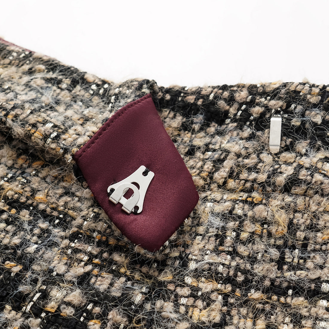 “Knightsbridge citywalk.” Tweed shorts – camel/black