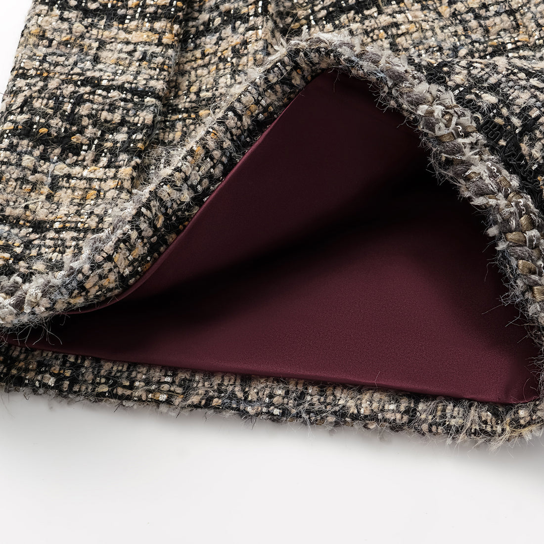 “Knightsbridge citywalk.” Tweed shorts – camel/black