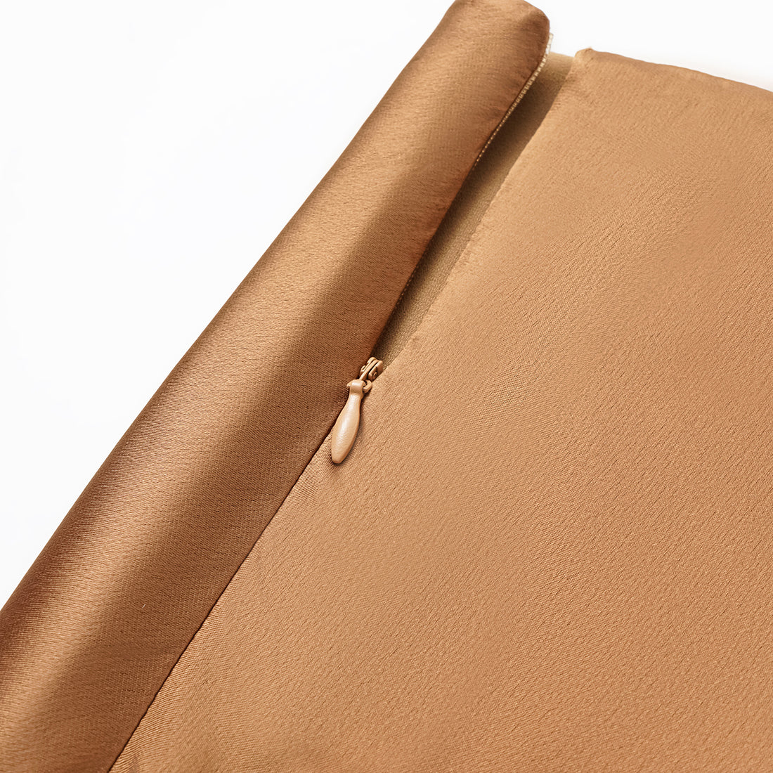 “Daytime sparkle.” Satin draped below-the-knee skirt—Caramel gold