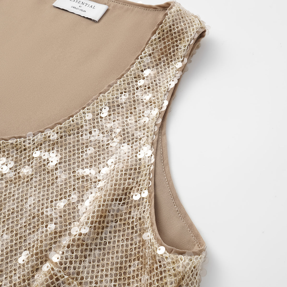 “Daytime Party.” Sparkling Knit Vest