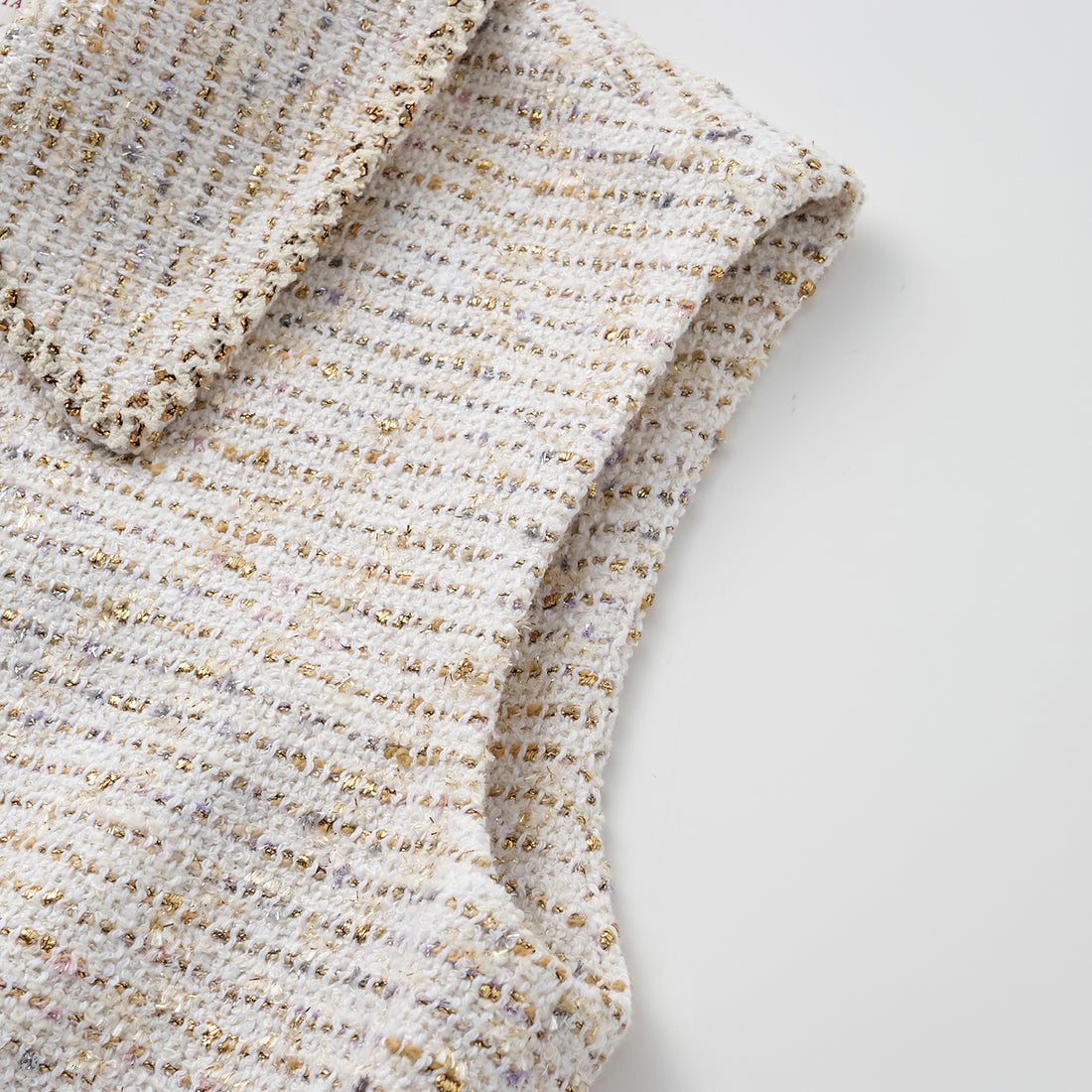 "Chelsea Citywalk." Spanish gold-finish lightweight tweed vest