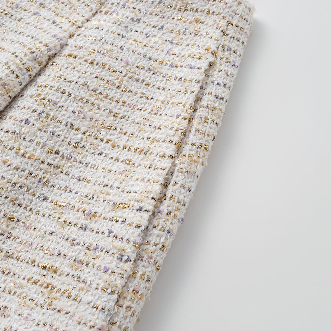 "Chelsea Citywalk." Spanish gold-finish lightweight tweed shorts