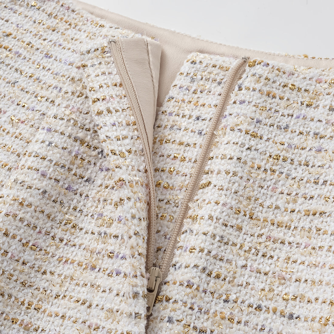 "Chelsea Citywalk." Spanish gold-finish lightweight tweed shorts