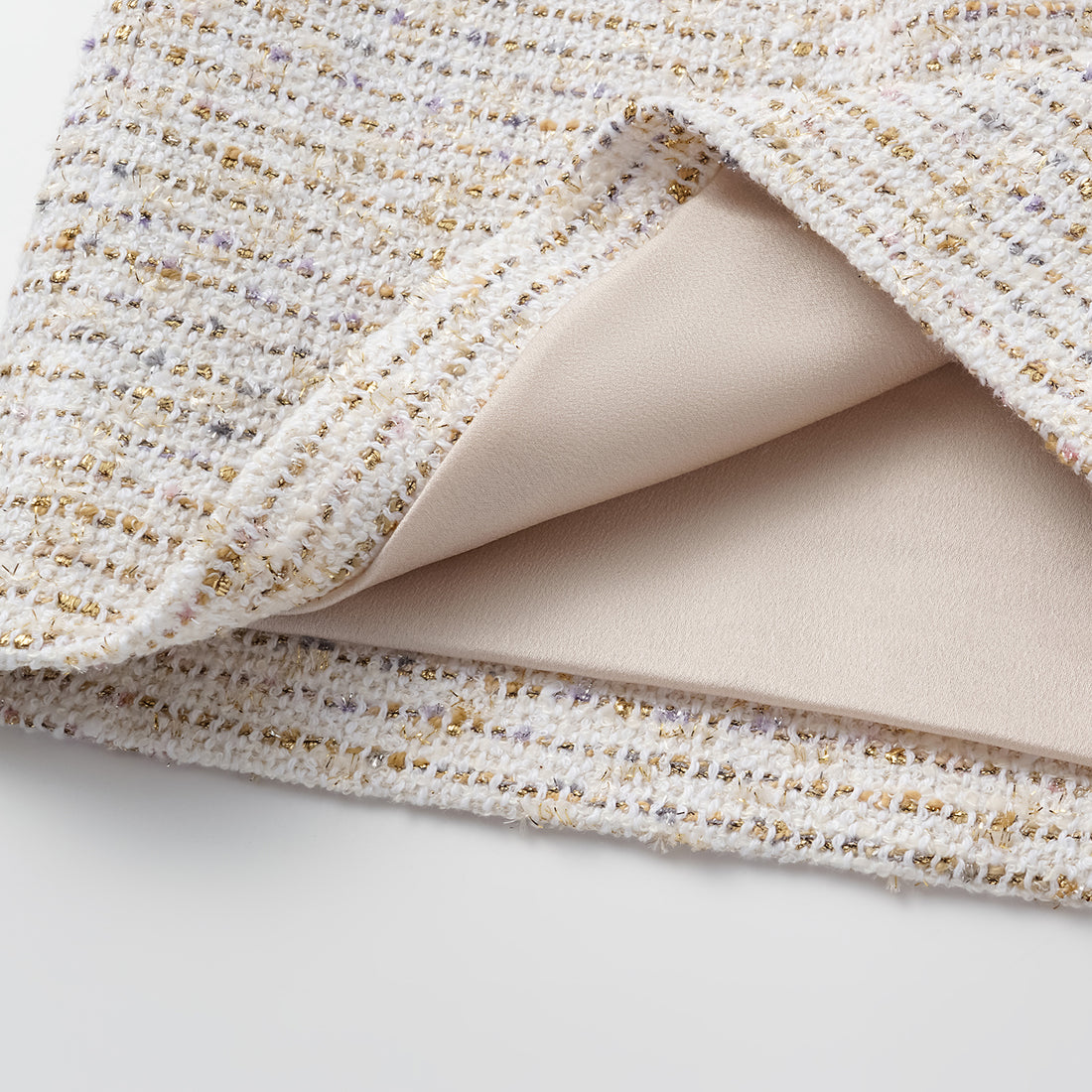 "Chelsea Citywalk." Spanish gold-finish lightweight tweed shorts