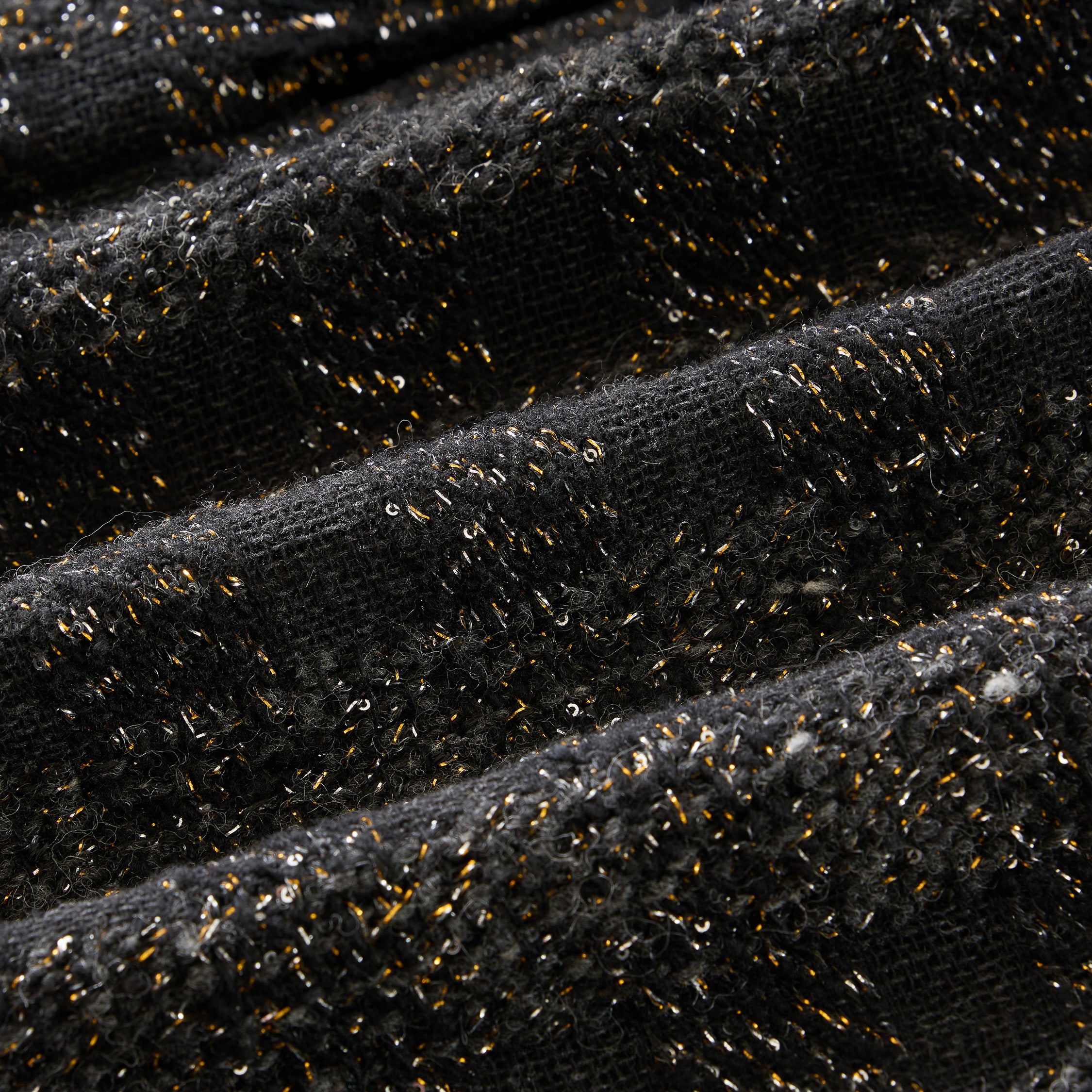 “Chelsea tea time.”義大利頂級初剪羊毛燦金星點Oversized花呢背心—Cosmic Bloom星河煙花