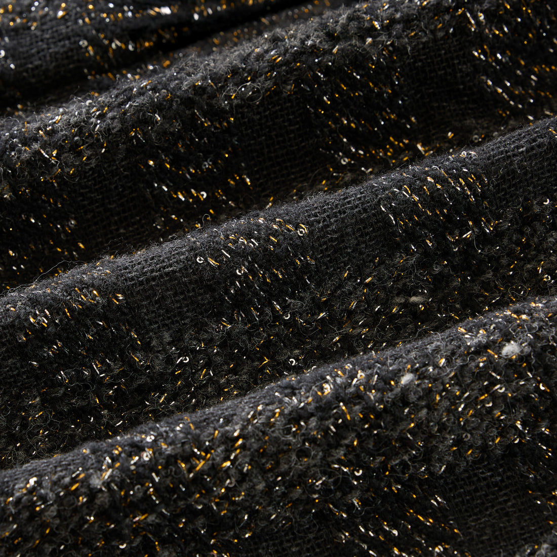 “Chelsea tea time.”義大利頂級初剪羊毛燦金星點Oversized花呢背心—Cosmic Bloom星河煙花