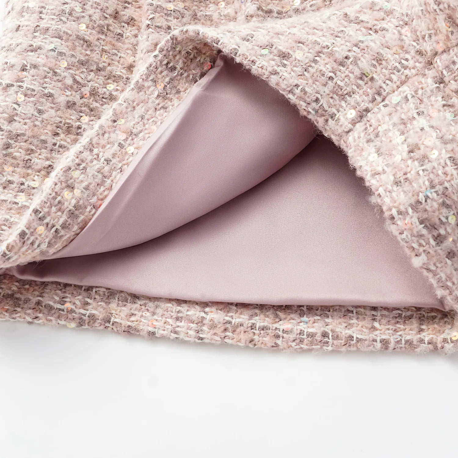 “Chelsea teatime.” Tweed shorts—Pink marshmallow 