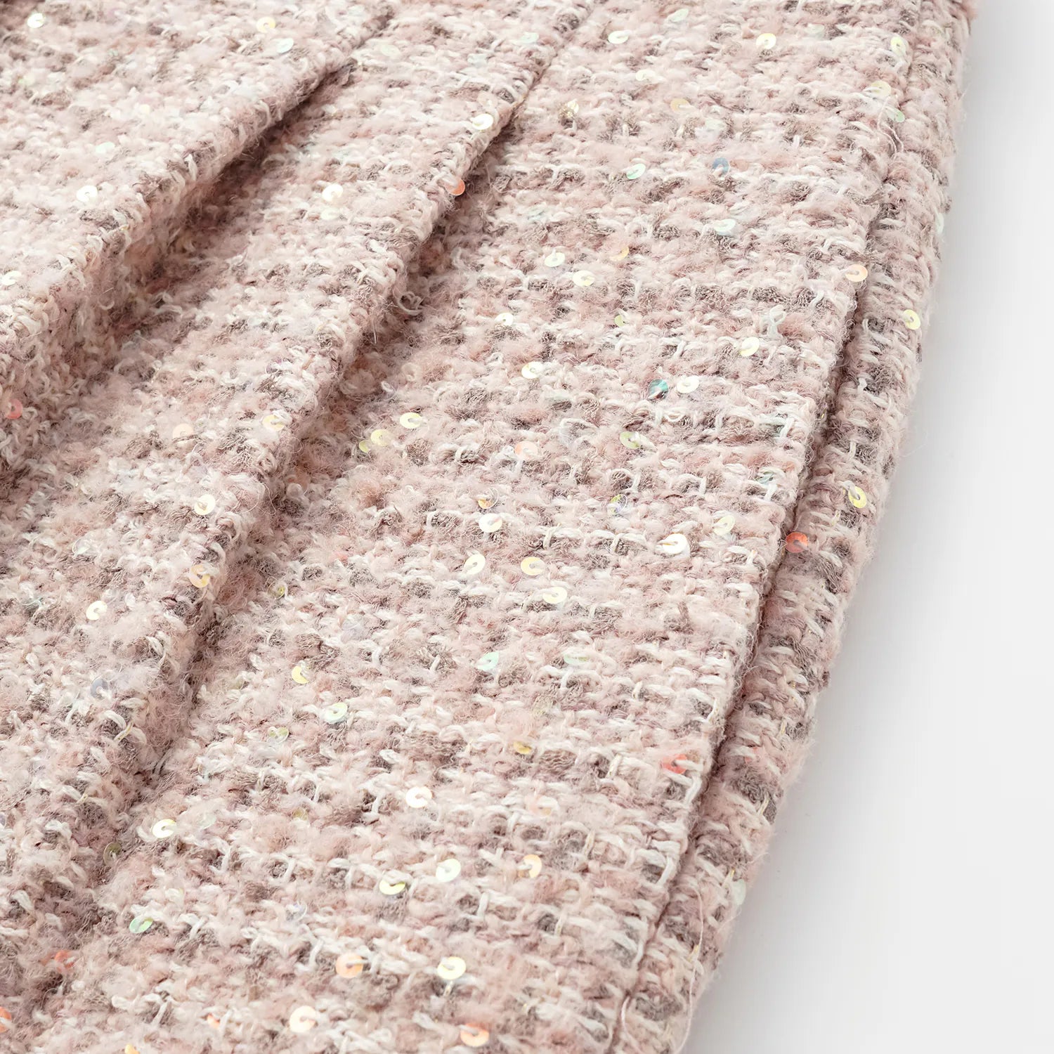 “Chelsea teatime.” Tweed shorts—Pink marshmallow 