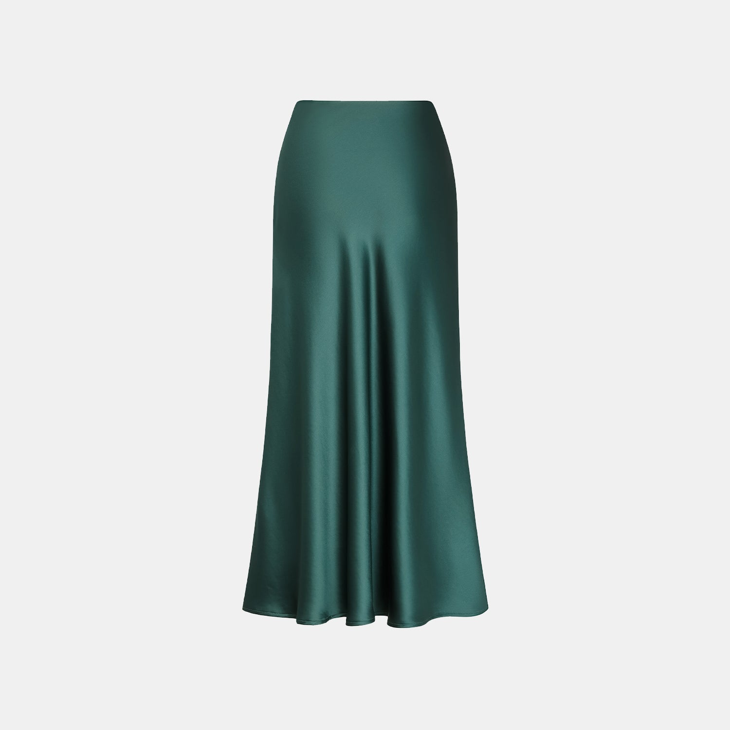 “Daytime sparkle.” 緞面垂墜膝下裙—祖母綠