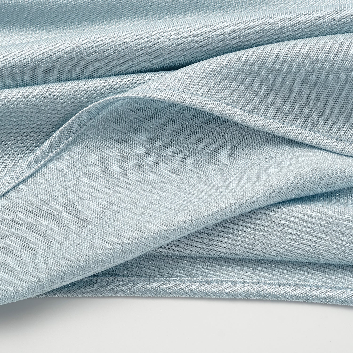 “Easy Go Chic” 醋酸針織面料特殊剪裁斜肩上衣 — 淺藍