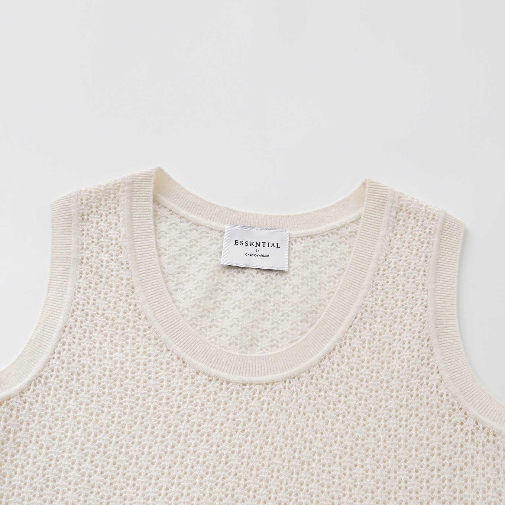 "Summer diary."Cashmere浮燦點織花眼工藝針織背心——Lumen of Summer夏澄微光