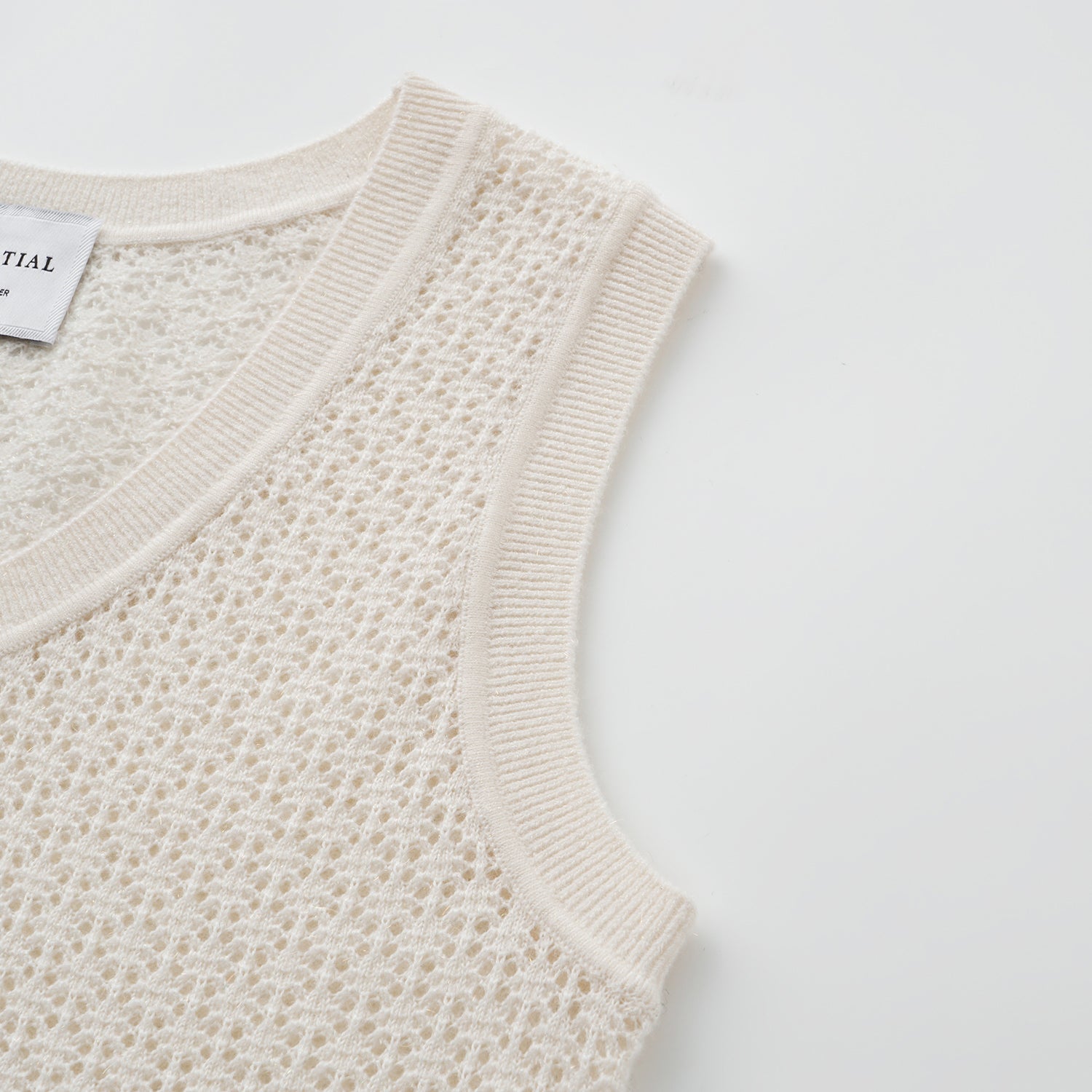 "Summer diary."Cashmere浮燦點織花眼工藝針織背心——Lumen of Summer夏澄微光