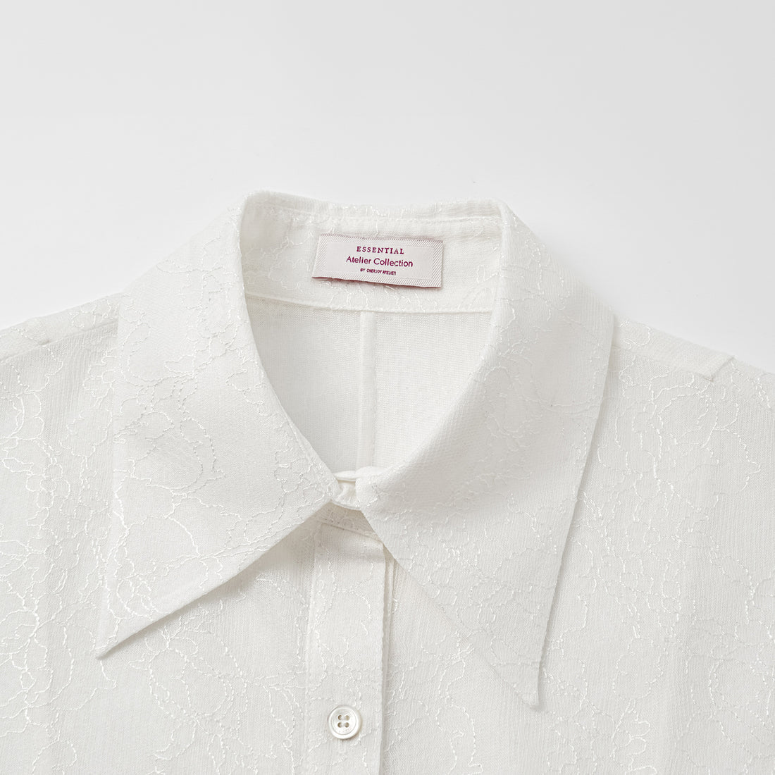 "Daytime Sparkle." Sleeveless shirt with French premium laminated lace