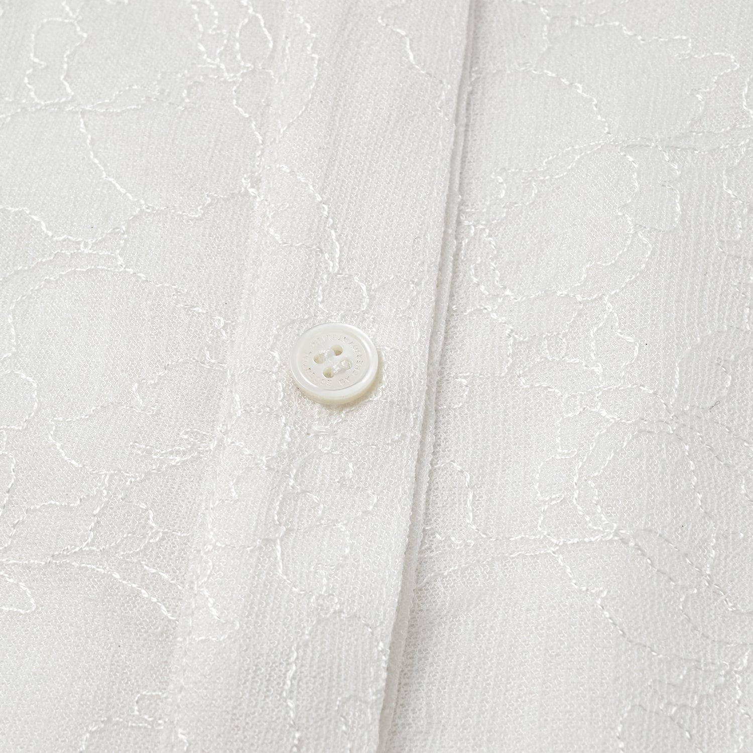 “Daytime Sparkle.” 法國頂級貼層蕾絲工藝無袖襯衫