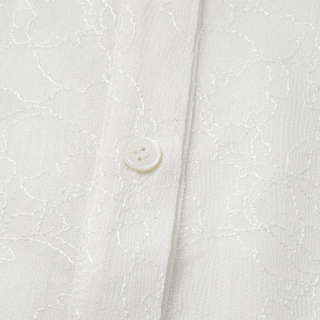"Daytime Sparkle." Sleeveless shirt with French premium laminated lace