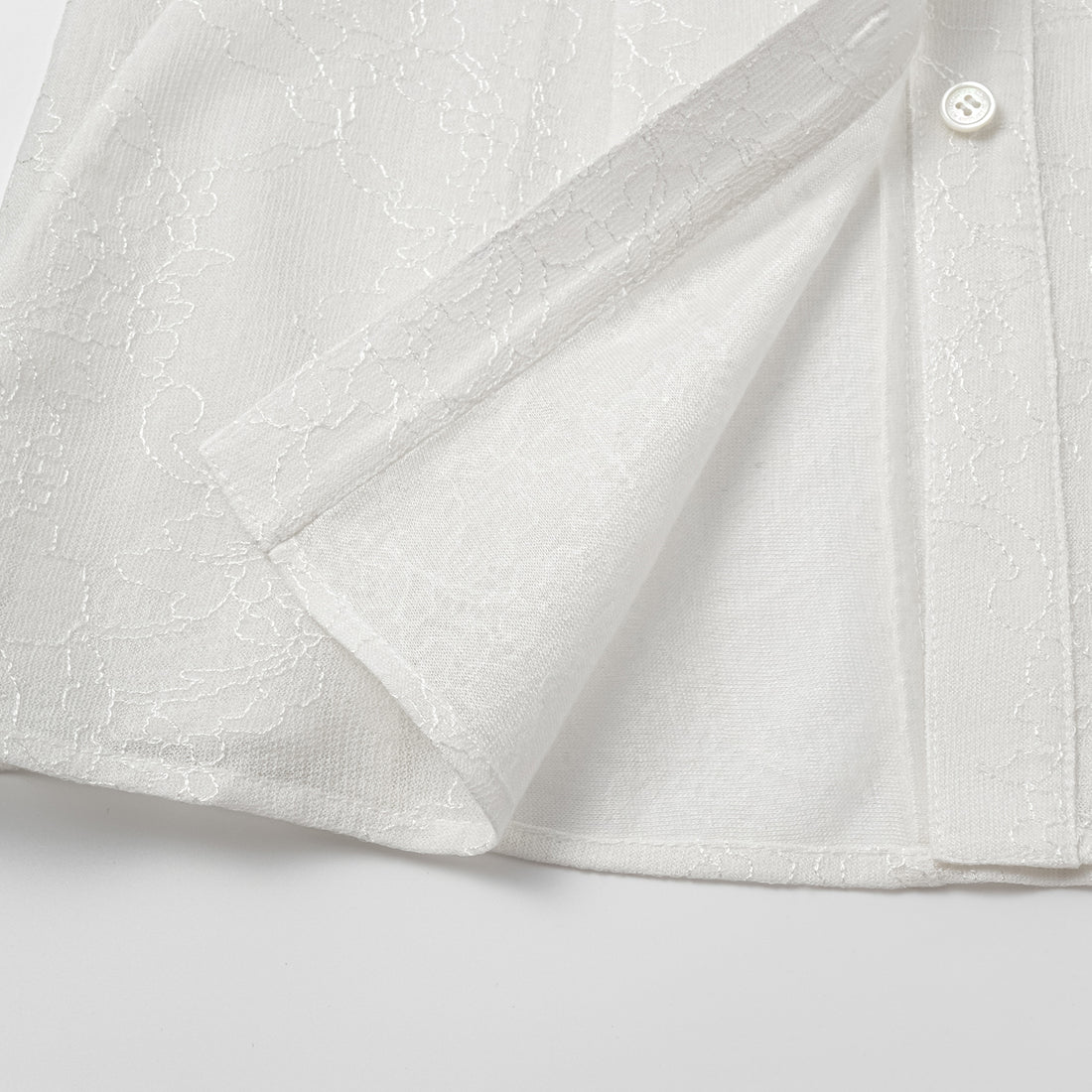 "Daytime Sparkle." Sleeveless shirt with French premium laminated lace