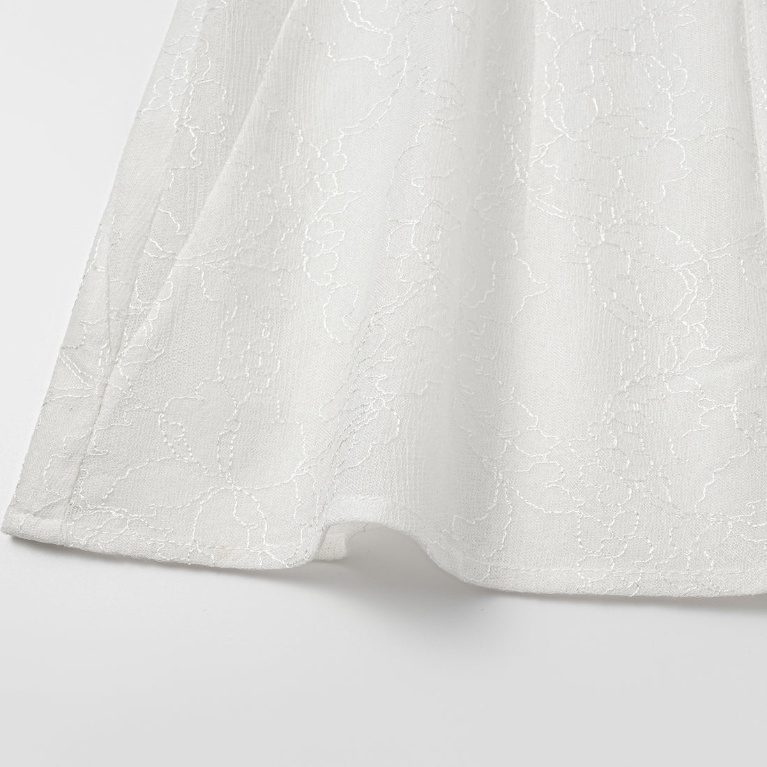 "Daytime Sparkle." Sleeveless shirt with French premium laminated lace